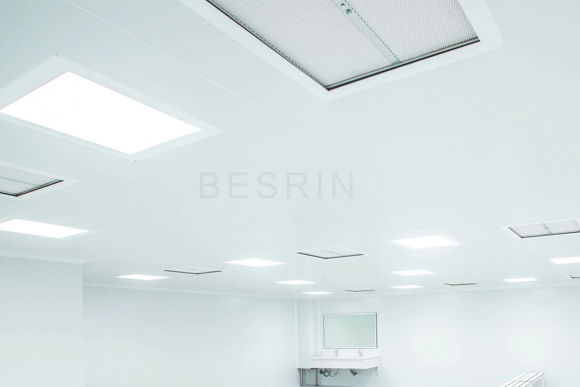 Cleanroom ceiling, lighting and air-supply interfaces